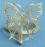 Casting of a golden filigree butterfly brooch